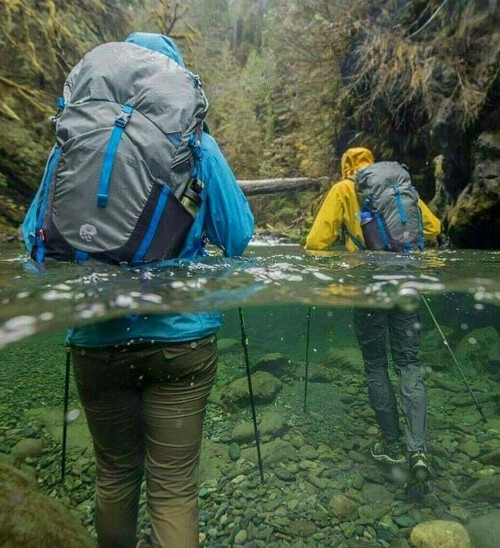 river hiking fully clothed